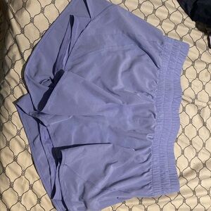 Selling purple shorts